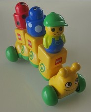 DIE SUPERSÜSSE Lego DUPLO PRIMO RAUPE mit  Männchen und Rasselsteinen