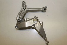 Idler Strut Footrest Holder