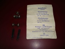 H0 Eisenbahn -  50x alte DDR-Schwellenklammern, 3x Metallräder und Kupplungen