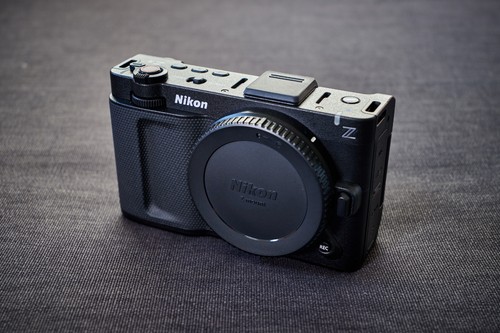 Nikon - , zr