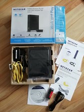 Netgear WNB2100-100 GRS  N300 Wireless Router mit USB Adapter-Set