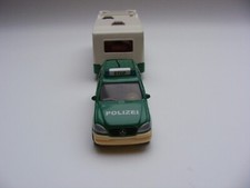 Siku  2311 Mercedes Benz ML  Polizei PKW mit Wohnwagen gebraucht .