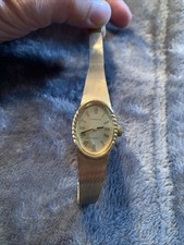 Dugena Damen-Armbanduhr Handaufzug 18 mm Breit Goldfarbig