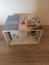 Tchibo Trinkbecher MUG aus