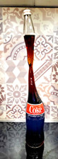 Coca Cola Glas Flasche gedreht
