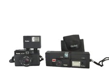 (2) Rollei Cameras and (2)