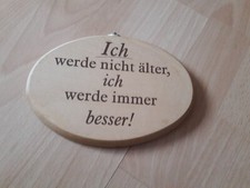 Holzschild mit Spruch