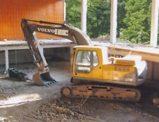 Alter Bagger Volvo EC210B Foto