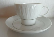 Kaffeetasse und UT Thomas