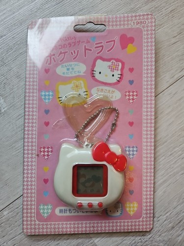 Tamagotchi hello kitty - -,