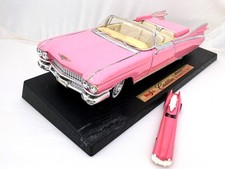 Bundle Maisto® Modell*Cadillac ELDORADO BIARRITZ*1959*Pink+SANRIO Kugelschreiber