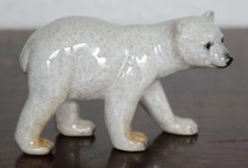 DEKORATIVE PORZELLANFIGUR "SCHREITENDER EISBÄR" OHNE MARKE #11853