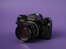 Canon AE-1 schwarz + FD