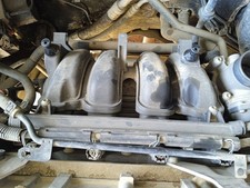 038129713J ANSAUGKRÜMMER /