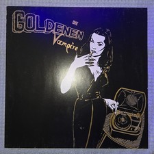 Die Goldenen Vampire-Hinter