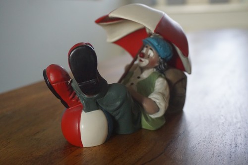 Gilde clown mit sonnenschirm - clown,