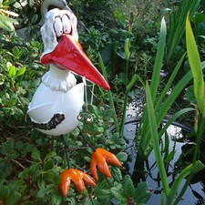 Keramik *Storch mit Frosch*