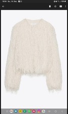 JACKE MIT FRANSEN FEDERN UND