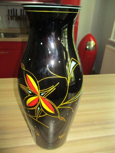 Schwarze vase mit farbigem - schwarze,