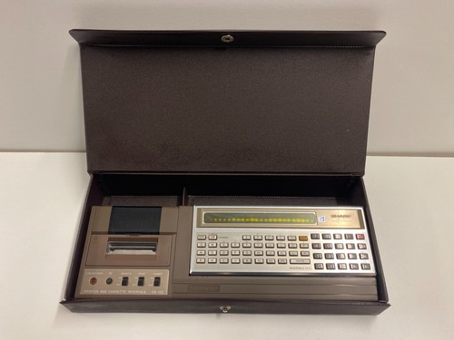 Sharp 1211 taschencomputer - sharp,