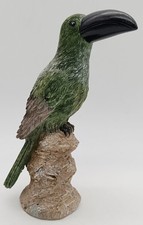 Tukan auf Felsen, Figur aus