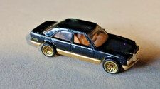 Hot Wheels ®  MERCEDES 380 SEL  Black & Gold    Mainline 1998