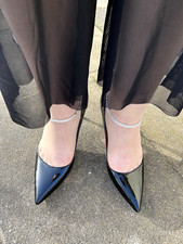 Schwarze Pumps mit roter innen