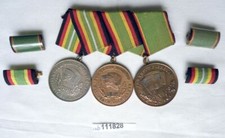 DDR Ordensspange NVA und KVP mit 3 Orden einer aus 900er Silber (111828)