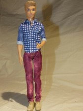 Barbie Kan Puppe mit  zusätzlichen Klamotten