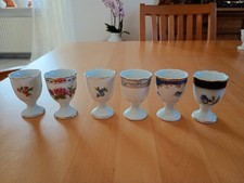 6 Eierbecher Hutschenreuther, aus Sammlung, mit Goldrand, verschiedene Designs 