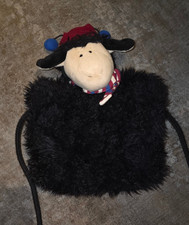 NICI Schaf Muff Handwärmer Schwarz