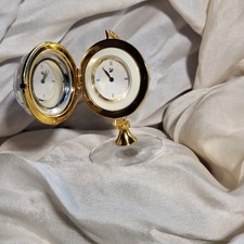 Swarovski Globus mit Uhr