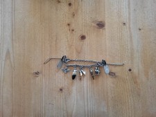 Charivari silberfarben mit viele verschiedene Anhängern