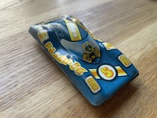 Tin Toy Car From the Former