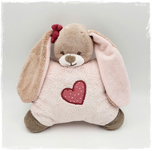Nattou rasseltier nina - *•.,
