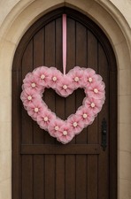 Handgefertigter rosa Herzkranz
