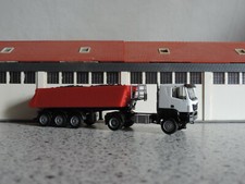 Iveco Trakker Allrad 5-achs Schmitz Kippersattelzug - weiß-rot