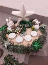 Adventsgesteck a. Holzscheibe