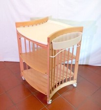 STOKKE SLEEPI CARE fasciatoio con materassino e contenitori. Color legno natural