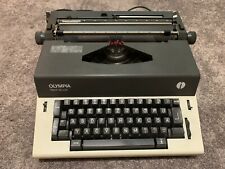 OLYMPIA Report de Luxe -