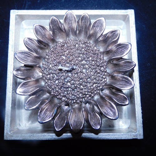 Sonnenblumenkerze versilbert