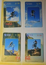 Sammler Telefonkarten aus Asien  4 Stück Set / Coca Cola   