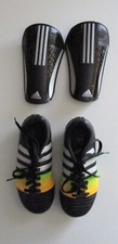 Adidas Fußballschuhe + Schienbeinschoner von Adidas für Jungen Gr. 29 