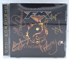 FM - Synchronized / Signiert