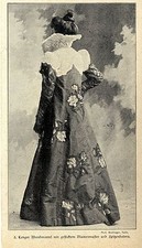 Historische Mode der Kaiserzeit Langer Abendmantel mit Spitzenbolero von 1900