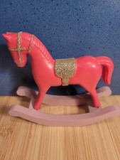 Schaukelpferd pink gold