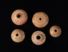 Römisch-keltische Spinnwirtel, eventuell auch Spielsteine mit Verzierungen