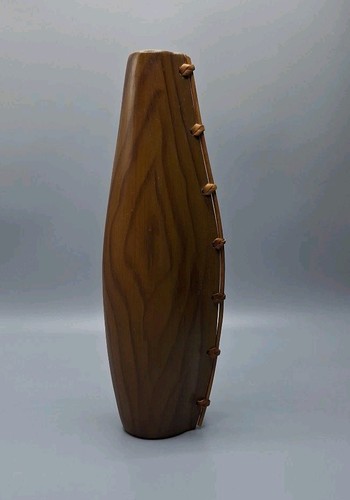 Afrikanische tonvase mit holz - afrikanische,