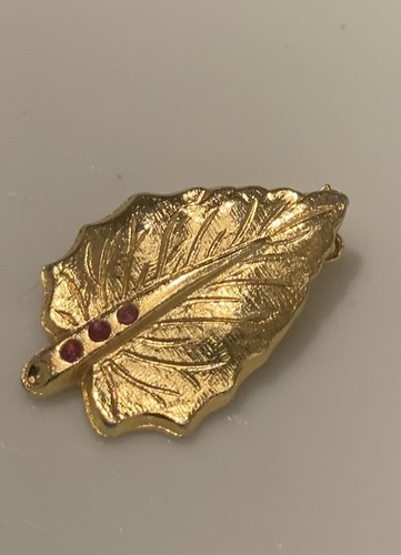 Elegante goldfarbene brosche - goldfarbene,