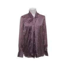 Makena Lei, Schluppenbluse